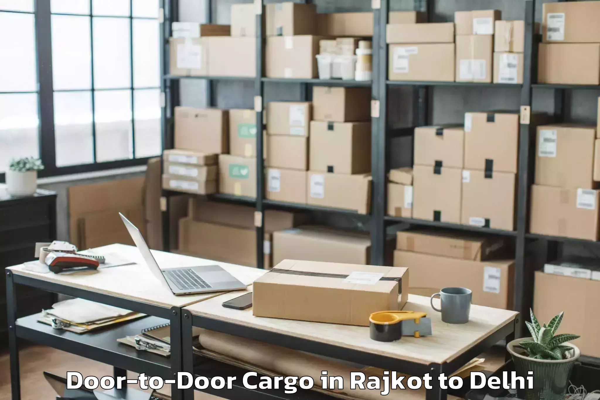 Affordable Rajkot to Unity One Janakpuri Mall Door To Door Cargo